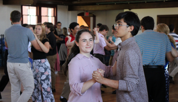 A student pair dances