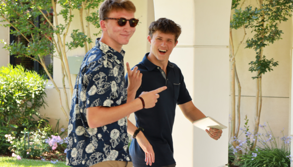 Students walk along the academic quadrangle