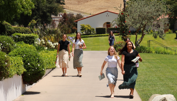 Students walk along the academic quadrangle