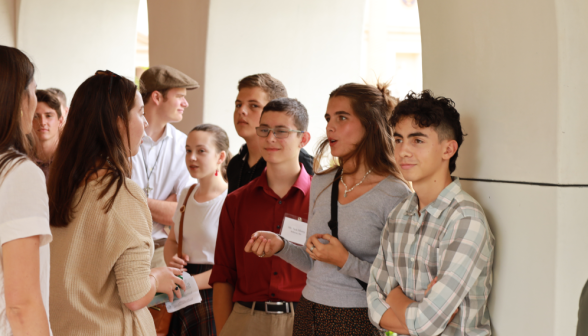 Students walk along the academic quadrangle