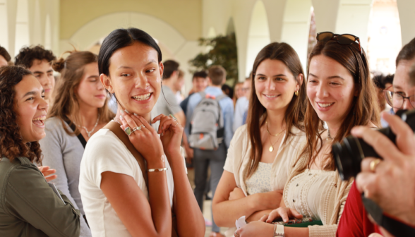 Students walk along the academic quadrangle