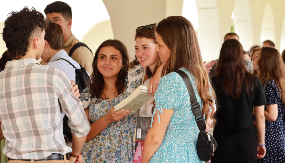 Students walk along the academic quadrangle