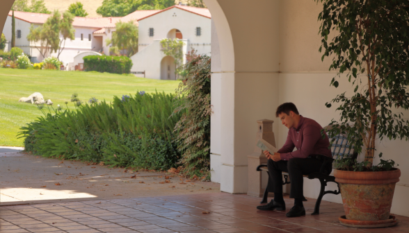 Students walk along the academic quadrangle