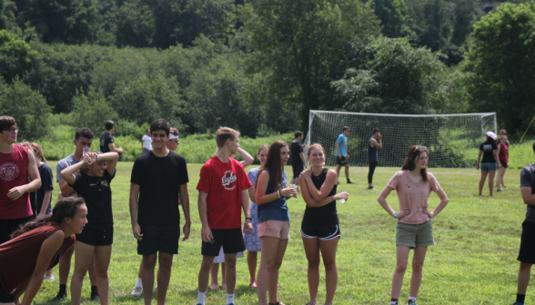 Students play volleyball