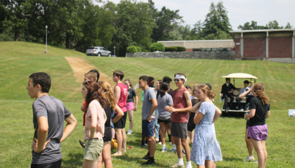 Students play volleyball