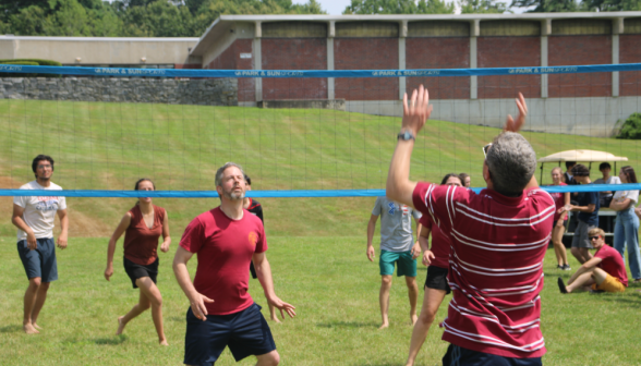 Students play volleyball