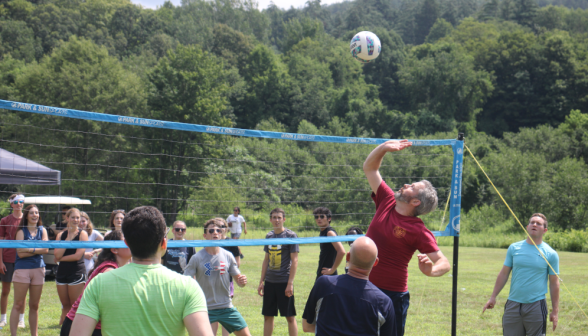 Students play volleyball