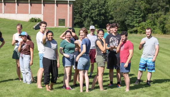 A group of students smiling at the camera.