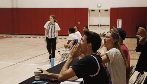 Students play basketball