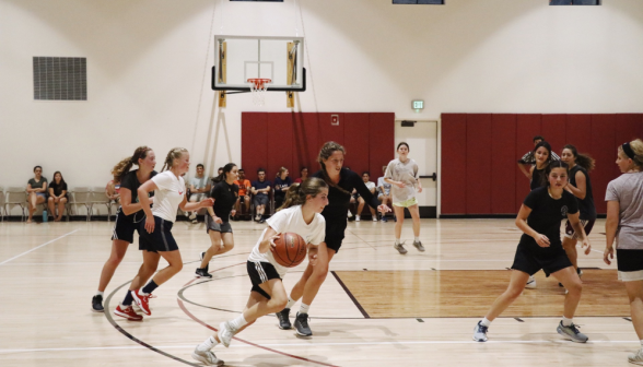 Students play basketball