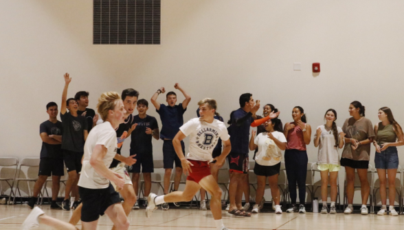 Students play basketball