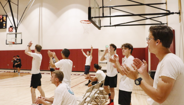 Students play basketball