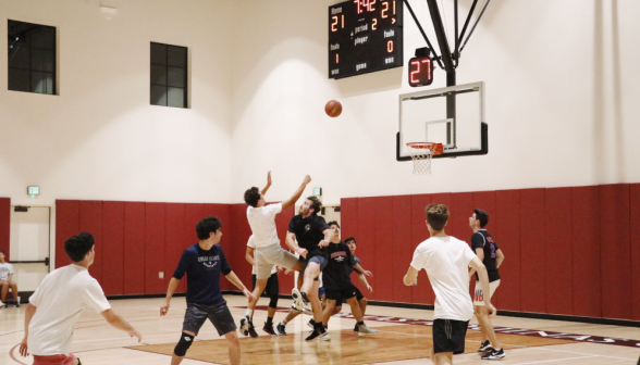 Students play basketball