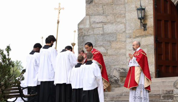 Fr. Miguel blesses the servers