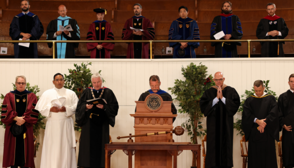 Fr. Markey at the podium