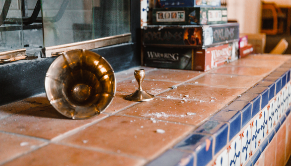 items knocked over on the mantlepiece