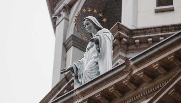 The statue of our lady on the top of the chapel