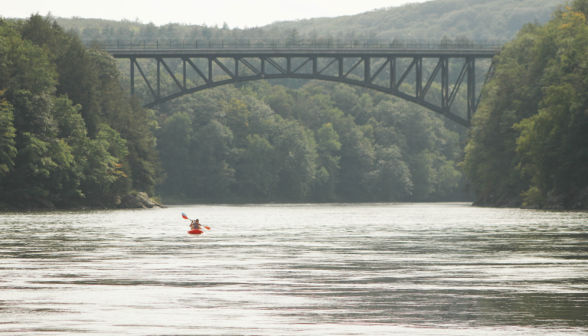 A gorgeous view of a bridge above the river...