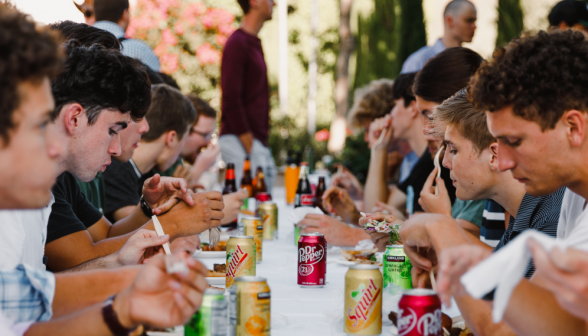 A very long table of people having a good time
