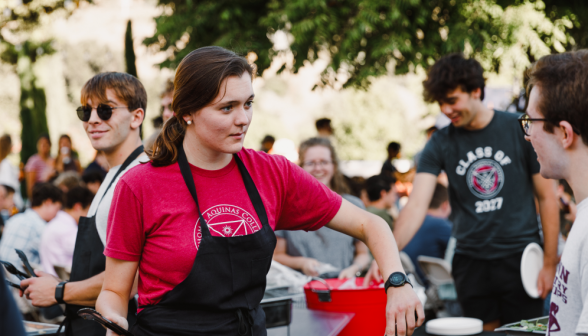 Senior helps serve food