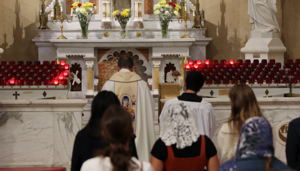 Fr. Markey leads the group in prayer