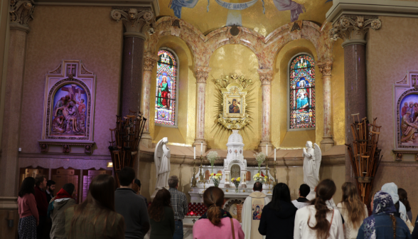 Fr. Markey leads the group in prayer