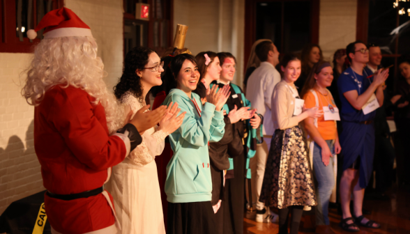 Dance attendees applaud the winners