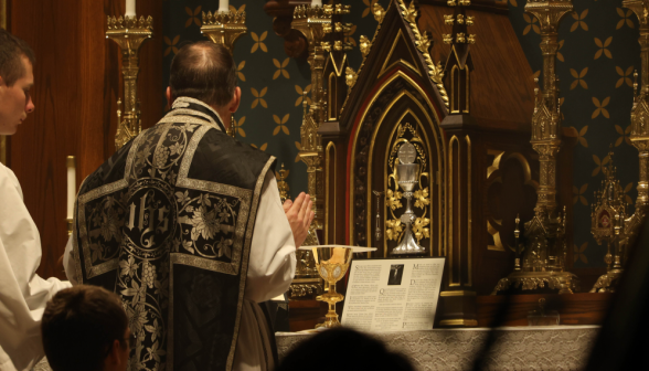 Fr. Markey blesses the wine