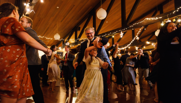 James McCann ('24) dances with a small child