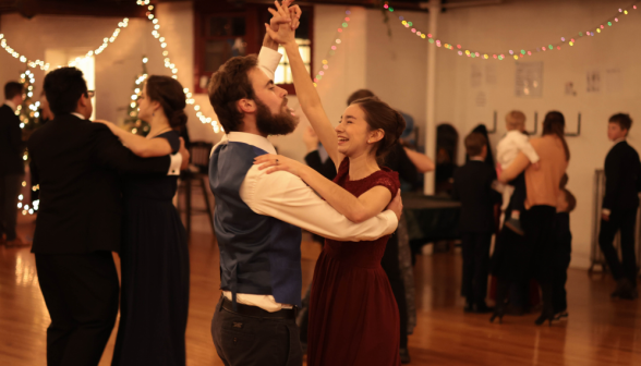 An alumnus returns to dance with his fiancee