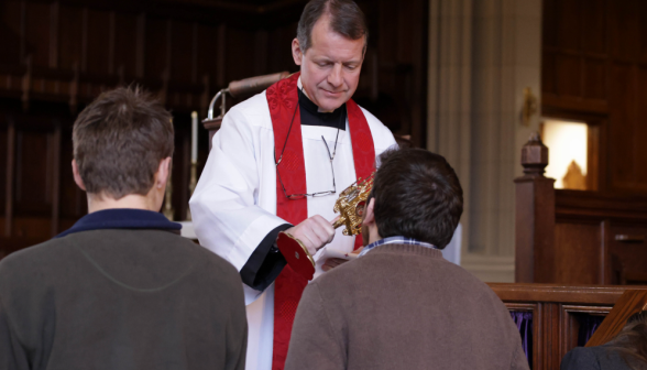 Blessing in New England with a relic of the True Cross