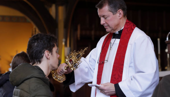 Blessing in New England with a relic of the True Cross