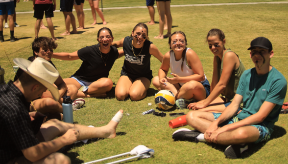 Students play volleyball
