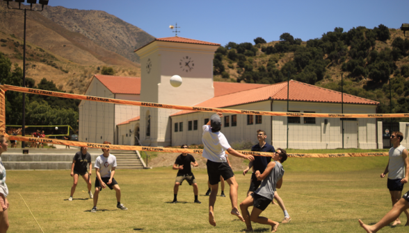 Students play volleyball