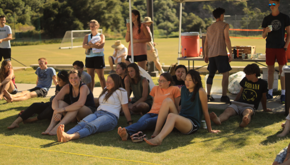 Students play volleyball