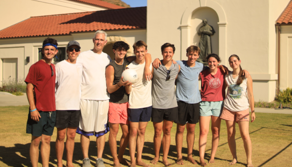 Students play volleyball