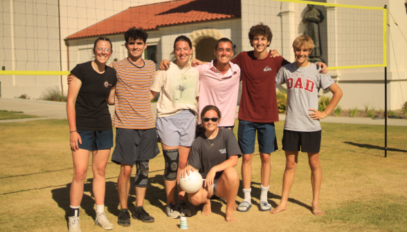 Students play volleyball