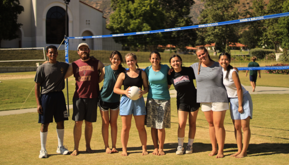 Students play volleyball