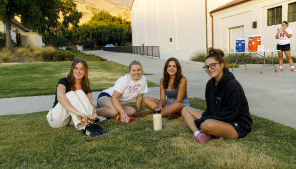 Students play volleyball