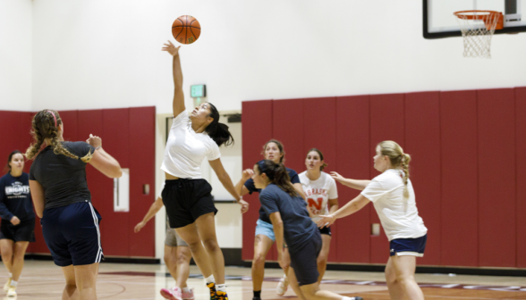Students play volleyball