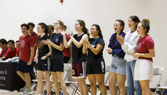 Students play volleyball