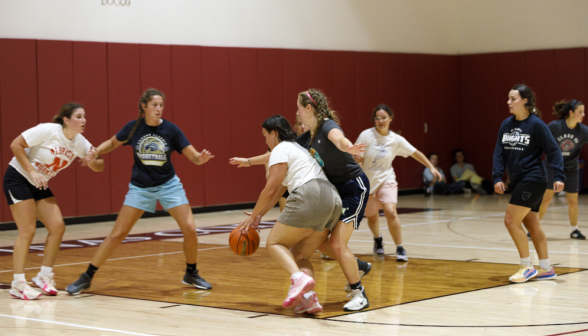 Students play basketball