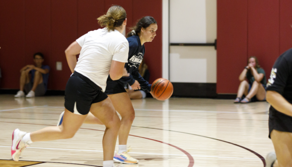 Students play basketball