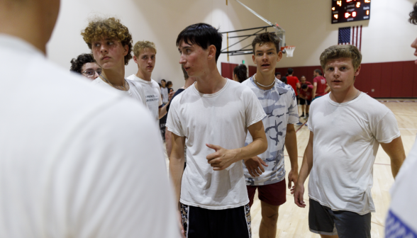 Students play basketball