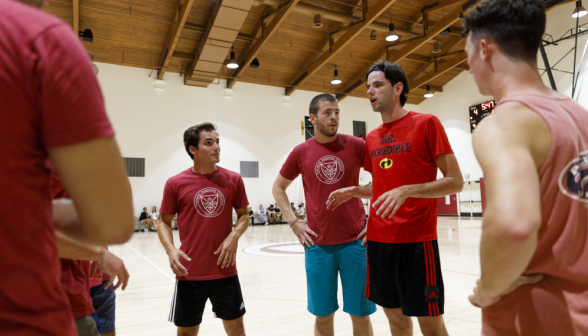 Students play basketball