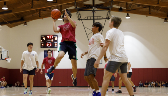 Students play basketball