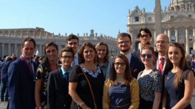 The Morlino family poses in Rome afront the basilica