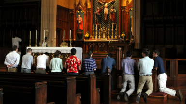 Students at the altar rail