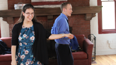 A pair of students practice their dance moves