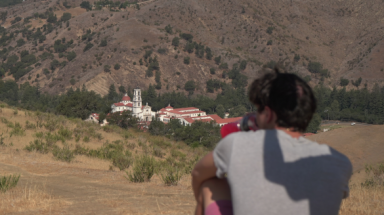 Students looks at Chapel in the distance